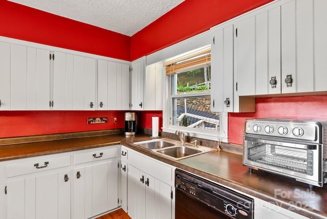 386 Country Club Dr Unit C6, Canton, NC 28716 - kitchen featuring dishwasher, a textured ceiling, and white cabinets
