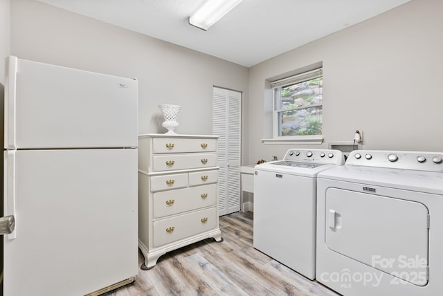 386 Country Club Dr Unit C6, Canton, NC 28716 - laundry room featuring washing machine and dryer and light wood-type flooring