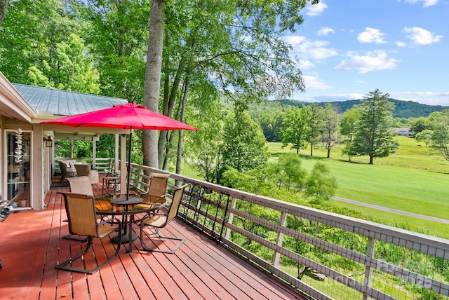 386 Country Club Dr Unit C6, Canton, NC 28716 - wooden terrace with outdoor dining area, a lawn, view of wooded area, and a mountain view