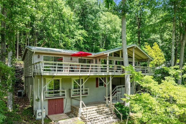 386 Country Club Dr Unit C6, Canton, NC 28716 - view of front of property featuring stairs, a deck, and stucco siding