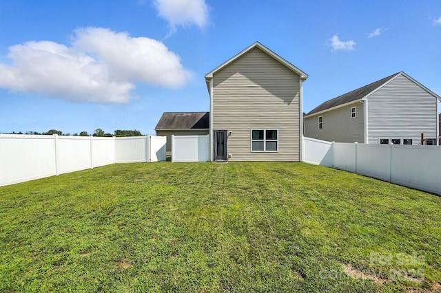 8152 Chilkoot Ln, Locust, NC 28097 - rear view of house with a fenced backyard