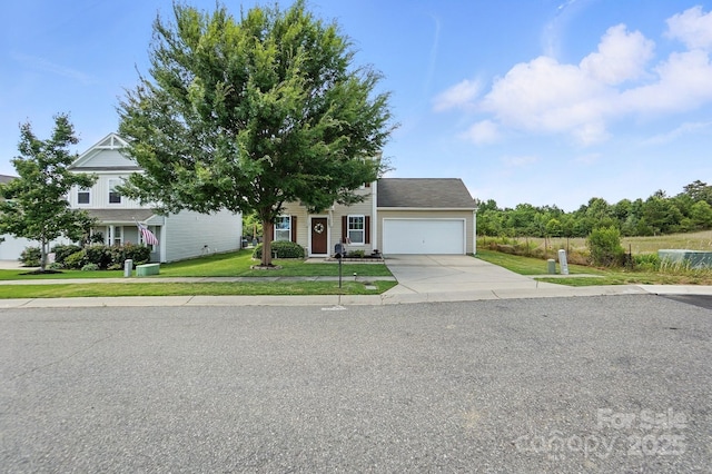 8152 Chilkoot Ln, Locust, NC 28097 - obstructed view of property featuring a garage, concrete driveway, and a front yard