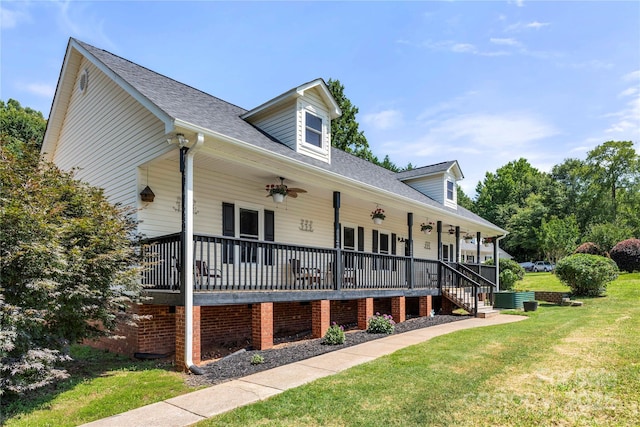 814 Carved Oak Ct, York, SC 29745 - view of front of house featuring a porch, a front yard, a ceiling fan, and a shingled roof