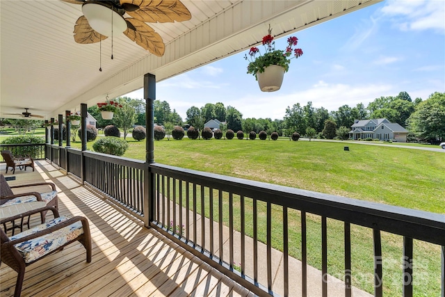 814 Carved Oak Ct, York, SC 29745 - wooden terrace with a ceiling fan, a lawn, and view of wooded area
