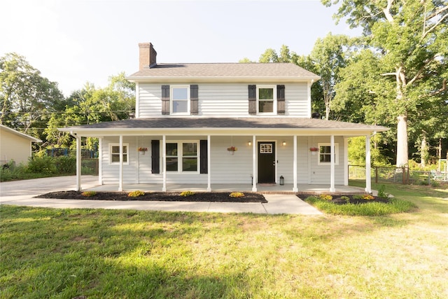 8012 Red Lantern Rd, Indian Trail, NC 28079 - farmhouse inspired home featuring a chimney and a porch