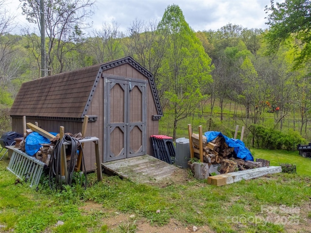 387 Sheep Rock Cove Rd, Whittier, NC 28789 - view of shed featuring a forest view