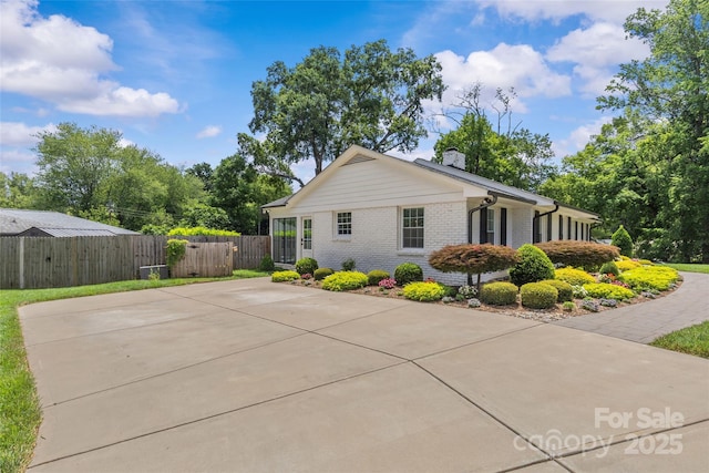 5501 Murrayhill Rd, Charlotte, NC 28210 - view of front of property with brick siding and a chimney