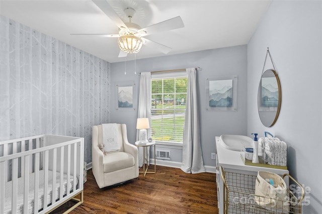 5501 Murrayhill Rd, Charlotte, NC 28210 - bedroom featuring wood finished floors, a nursery area, and a ceiling fan