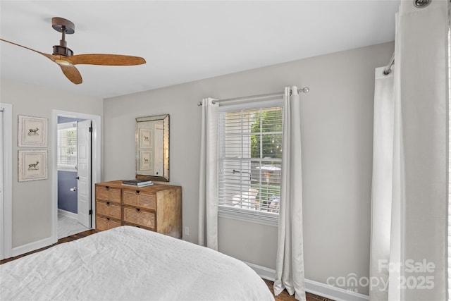 5501 Murrayhill Rd, Charlotte, NC 28210 - bedroom with wood finished floors, ensuite bath, and a ceiling fan