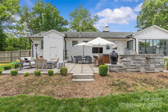 5501 Murrayhill Rd, Charlotte, NC 28210 - rear view of property with a patio area, a chimney, and brick siding