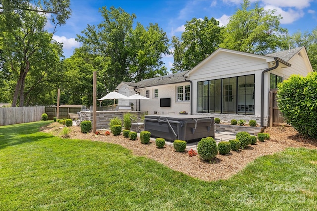 5501 Murrayhill Rd, Charlotte, NC 28210 - back of property featuring a hot tub and a patio area