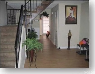 153 W End St, Chester, SC 29706 - stairway featuring wood finished floors and baseboards