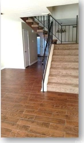 153 W End St, Chester, SC 29706 - stairs with wood finished floors and baseboards