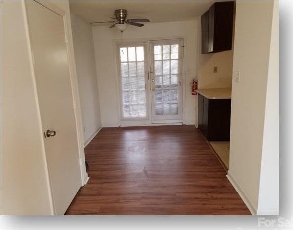 153 W End St, Chester, SC 29706 - unfurnished dining area with wood finished floors and ceiling fan
