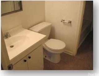 153 W End St, Chester, SC 29706 - half bathroom featuring vanity and toilet