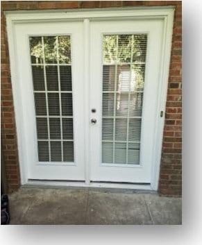 153 W End St, Chester, SC 29706 - doorway with brick wall and french doors