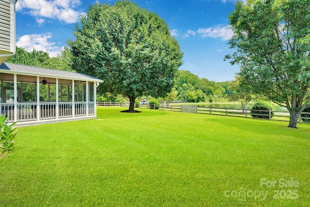 2004 Onotoa Dr, Indian Trail, NC 28079 - view of yard featuring a ceiling fan and a sunroom