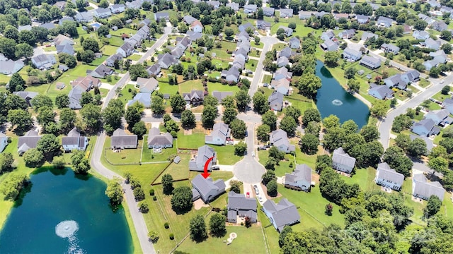 2004 Onotoa Dr, Indian Trail, NC 28079 - aerial perspective of suburban area with a nearby body of water