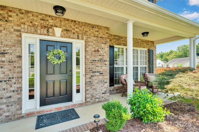 2004 Onotoa Dr, Indian Trail, NC 28079 - view of exterior entry with brick siding and covered porch