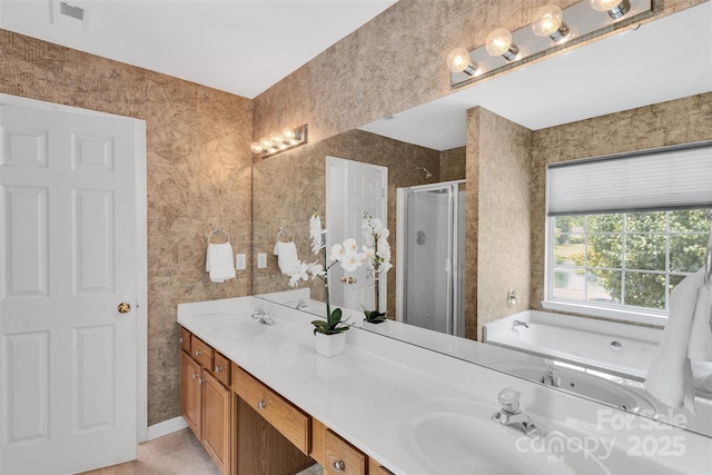2004 Onotoa Dr, Indian Trail, NC 28079 - full bath featuring a shower stall, double vanity, a bath, and tile patterned floors