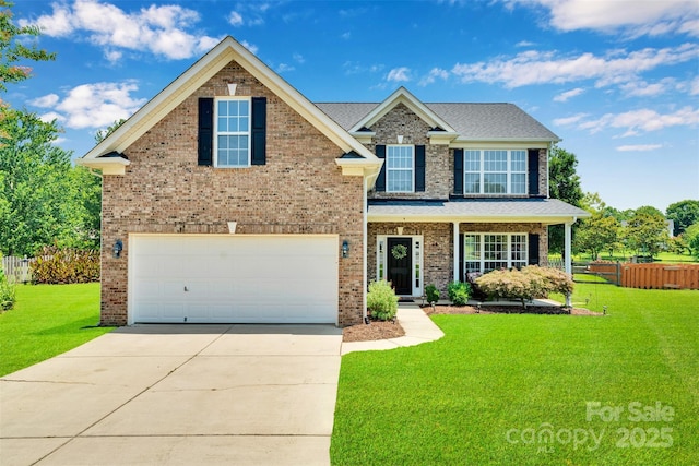2004 Onotoa Dr, Indian Trail, NC 28079 - view of front of home featuring brick siding, driveway, and a garage
