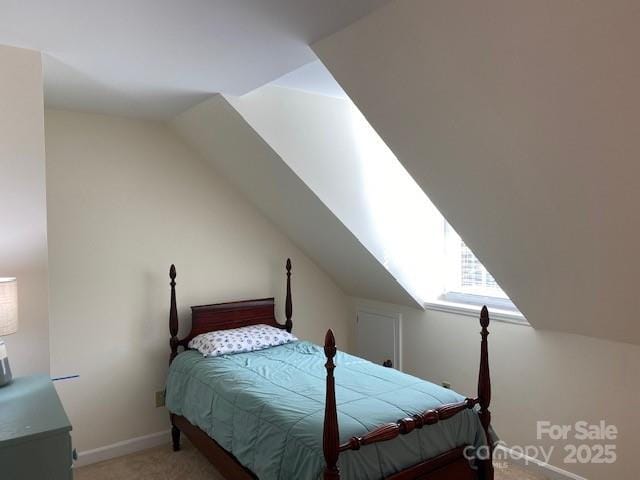 6632 Summer Darby Ln, Charlotte, NC 28270 - bedroom featuring light carpet and vaulted ceiling