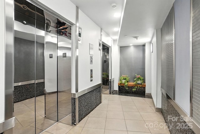 505 E 6th St Unit 908, Charlotte, NC 28202 - hall featuring tile patterned floors and recessed lighting