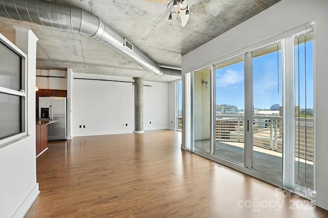 505 E 6th St Unit 908, Charlotte, NC 28202 - unfurnished room with wood finished floors and a view of city
