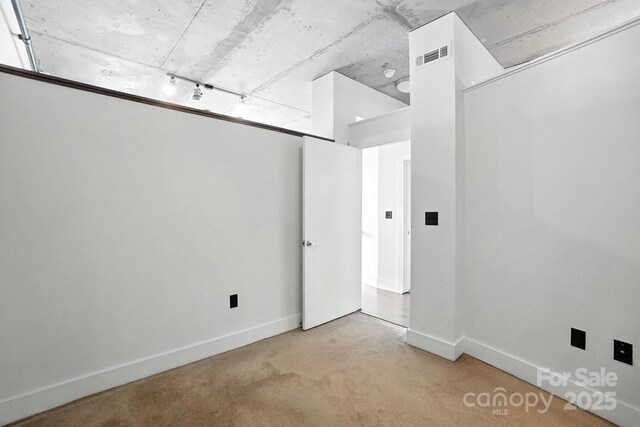 505 E 6th St Unit 908, Charlotte, NC 28202 - empty room featuring baseboards and concrete flooring