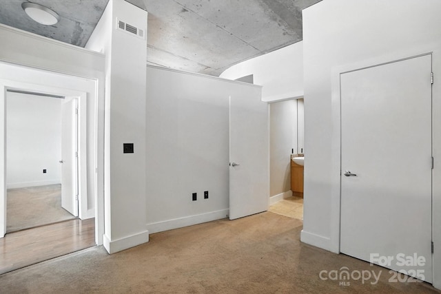 505 E 6th St Unit 908, Charlotte, NC 28202 - unfurnished bedroom with carpet and connected bathroom