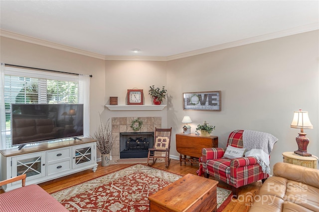 190 Shaws Creek Farm Rd, Hendersonville, NC 28739 - living area with ornamental molding, wood finished floors, and a fireplace