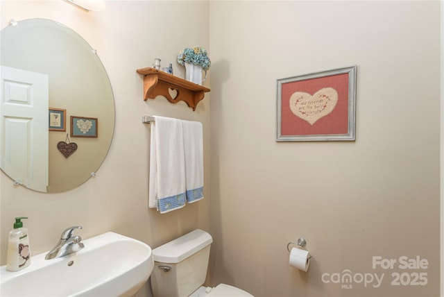 190 Shaws Creek Farm Rd, Hendersonville, NC 28739 - half bathroom with a sink and toilet