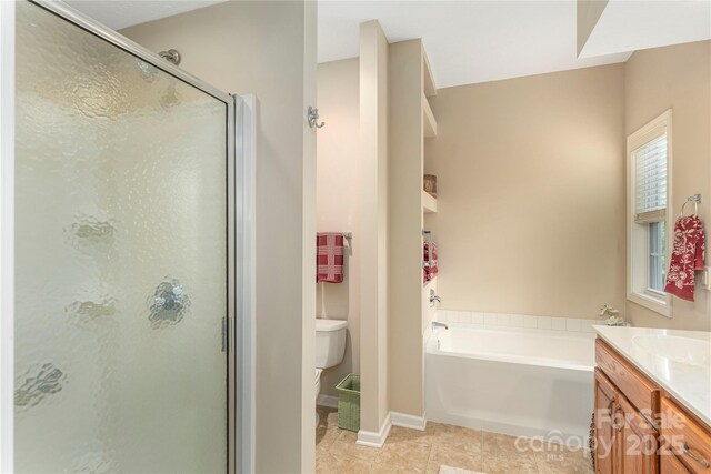 190 Shaws Creek Farm Rd, Hendersonville, NC 28739 - full bathroom with a stall shower, vanity, a garden tub, and tile patterned floors