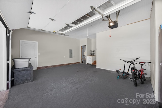 106 Abbey Cir, Salisbury, NC 28147 - garage featuring a garage door opener and electric panel