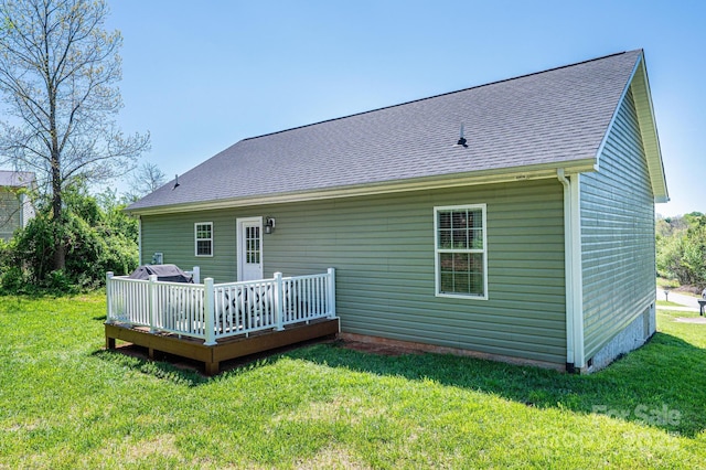 50 Serenity Ln, Hickory, NC 28601 - rear view of house with a deck, a lawn, and roof with shingles