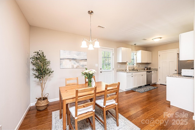 50 Serenity Ln, Hickory, NC 28601 - dining area with dark wood-style floors and a chandelier