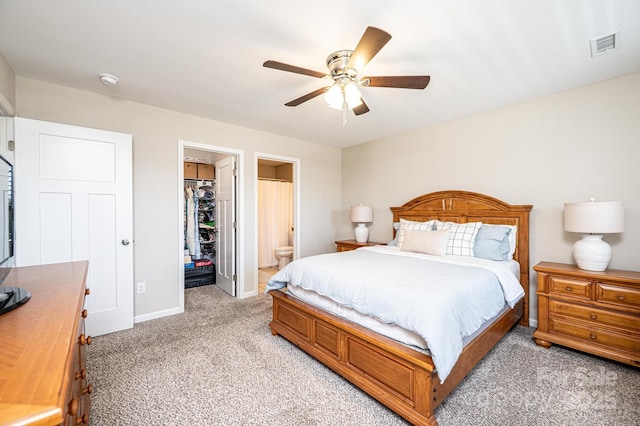 50 Serenity Ln, Hickory, NC 28601 - bedroom with light colored carpet, a closet, a spacious closet, a ceiling fan, and ensuite bathroom