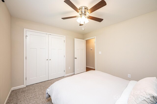 50 Serenity Ln, Hickory, NC 28601 - carpeted bedroom featuring a closet and a ceiling fan
