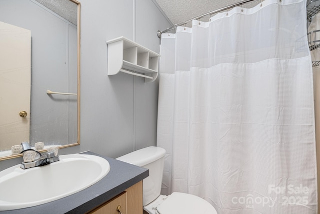6 Kims Ct, Clyde, NC 28721 - bathroom with vanity, a textured ceiling, and curtained shower