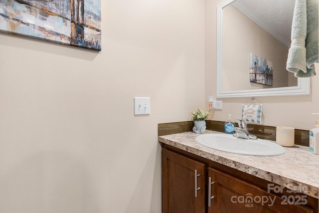 200 Vista Pointe Dr, Stony Point, NC 28678 - bathroom with vanity and ornamental molding