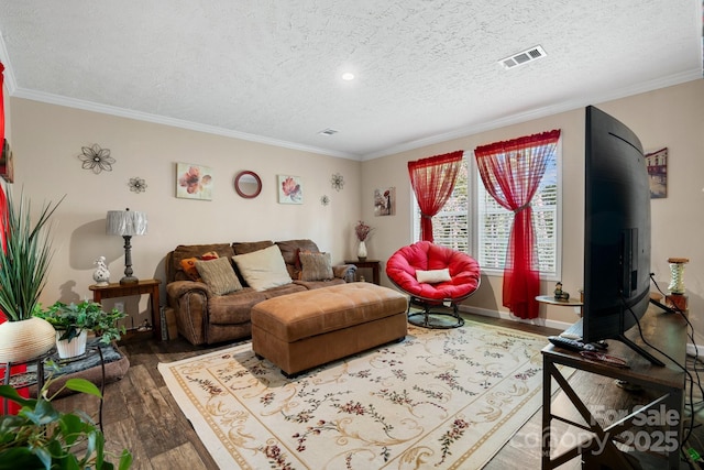 200 Vista Pointe Dr, Stony Point, NC 28678 - living room with wood finished floors, a textured ceiling, crown molding, and a wood stove