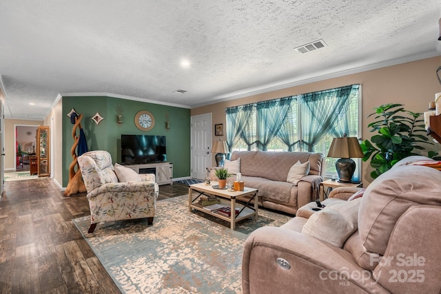 200 Vista Pointe Dr, Stony Point, NC 28678 - living area with wood finished floors, crown molding, and a textured ceiling