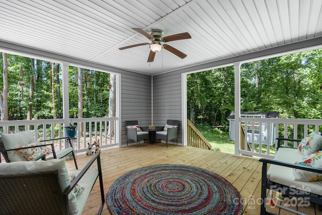 200 Vista Pointe Dr, Stony Point, NC 28678 - sunroom with ceiling fan, an outdoor hangout area, and view of wooded area
