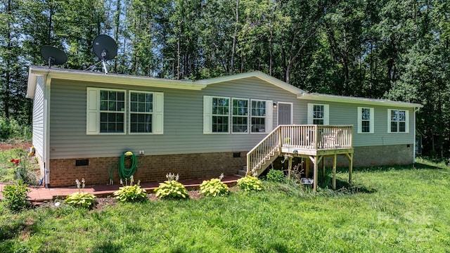 200 Vista Pointe Dr, Stony Point, NC 28678 - view of front facade featuring a deck, crawl space, a front yard, and stairs