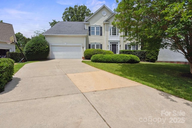 9954 Mitchell Glen Dr, Charlotte, NC 28277 - view of front facade with a garage, driveway, and a front lawn