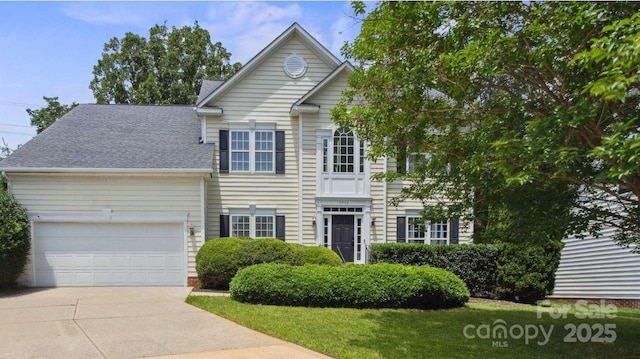 9954 Mitchell Glen Dr, Charlotte, NC 28277 - view of front of house with driveway, an attached garage, and a shingled roof