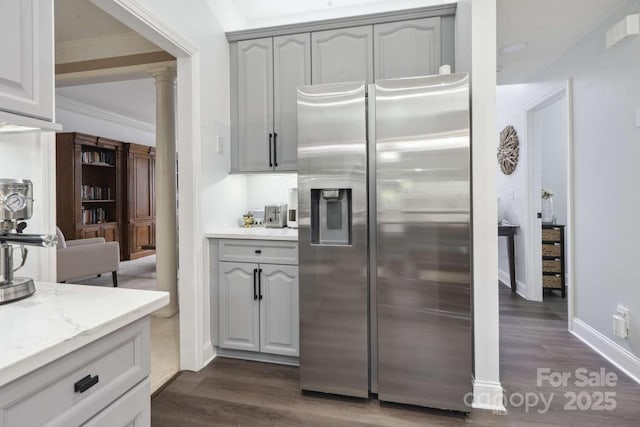 9954 Mitchell Glen Dr, Charlotte, NC 28277 - kitchen featuring stainless steel refrigerator with ice dispenser, dark wood-style flooring, gray cabinetry, and ornamental molding