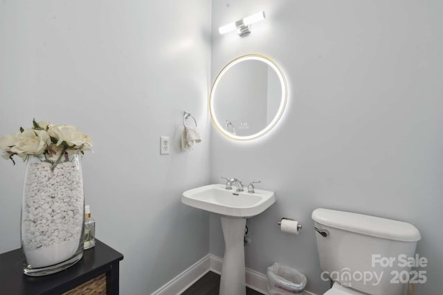 9954 Mitchell Glen Dr, Charlotte, NC 28277 - half bathroom featuring toilet and baseboards
