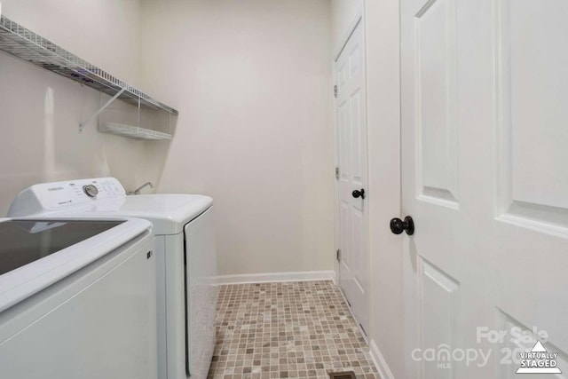 9954 Mitchell Glen Dr, Charlotte, NC 28277 - washroom featuring washer and dryer and baseboards