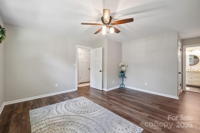10206 Washam Potts Rd, Cornelius, NC 28031 - unfurnished bedroom with wood finished floors, a ceiling fan, and connected bathroom